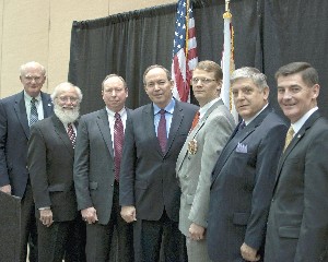 Gathering at the March meeting are (l-r) Rick Driesbach, Tennessee Valley Air Force Association (AFA); Stan Miller, National Military Intelligence Association; Guy Broadhurst, AFA; Lt. Gen. David A. Deptula, USAF (Ret.); Jeff Gronberg, National Defense Industrial Association; Vic Budura, chapter president; and Gary Connor, AFA.